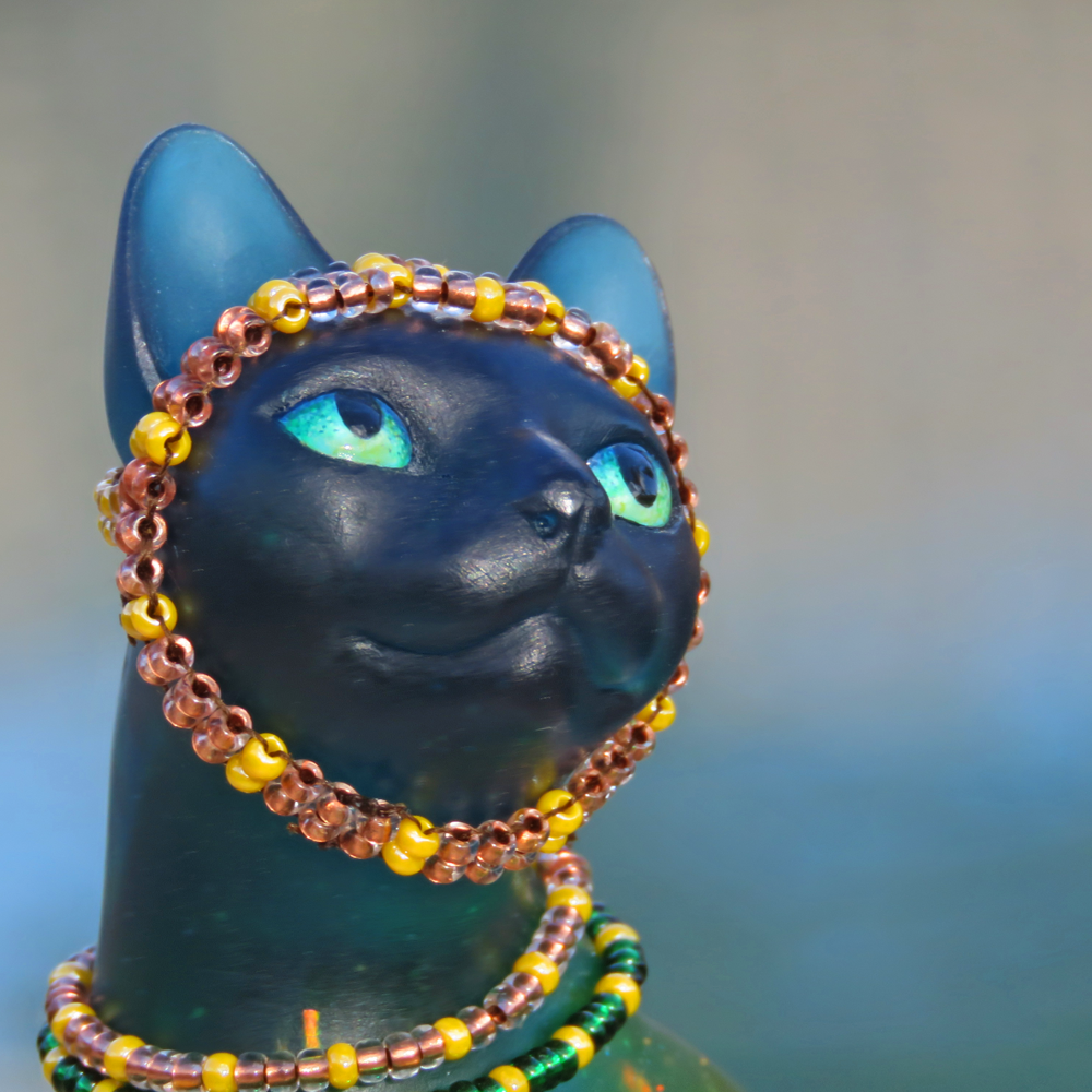 Feline art by Brutal Sun.
