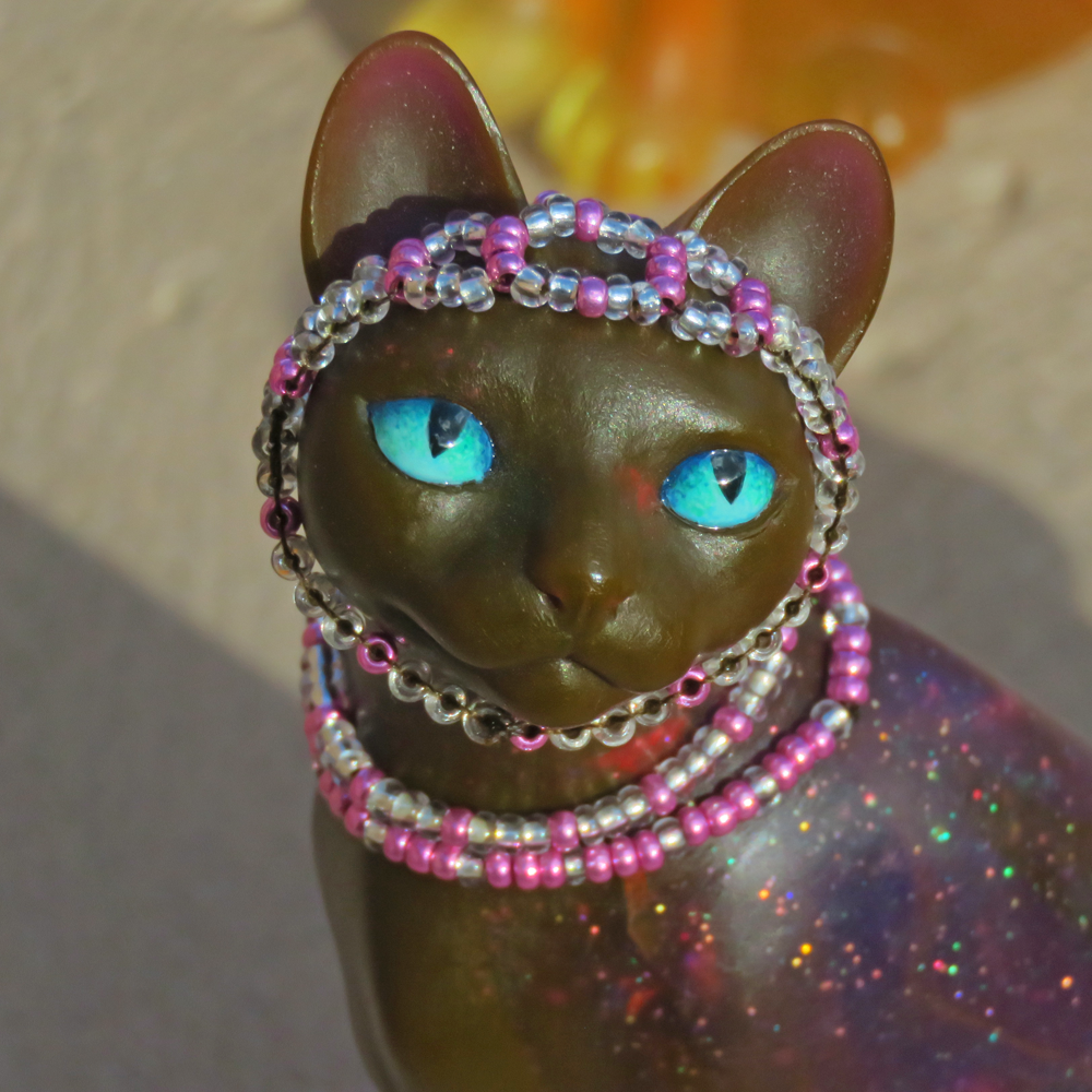 Feline art by Brutal Sun.
